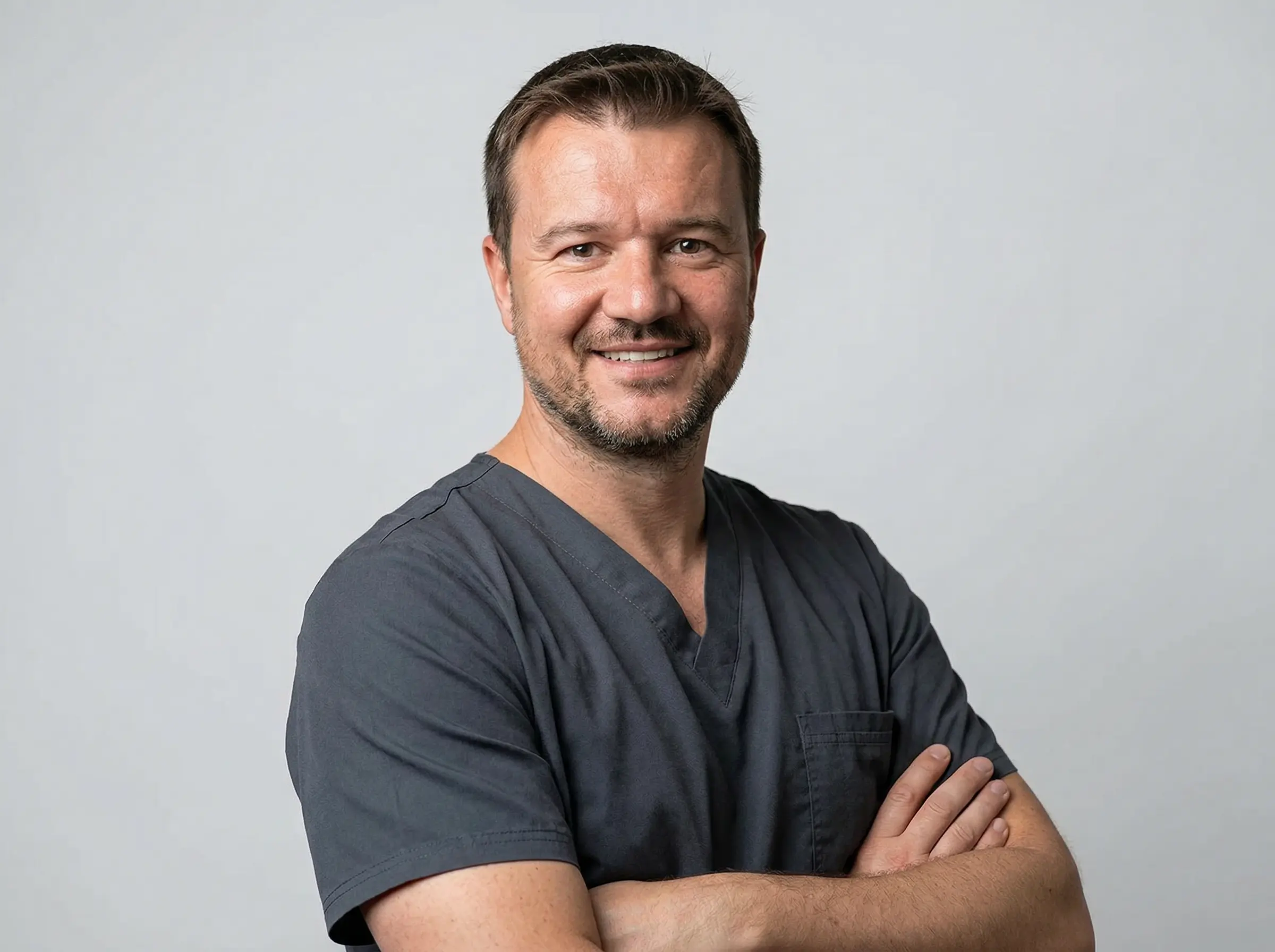 Dr Tomislav Cerovecki photo in scrub outfit Orthopaedic Surgeon Dubai United Arab Emirates